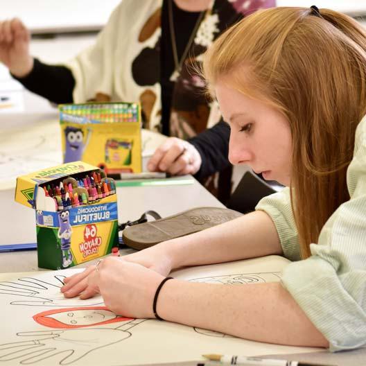 A student in art education class